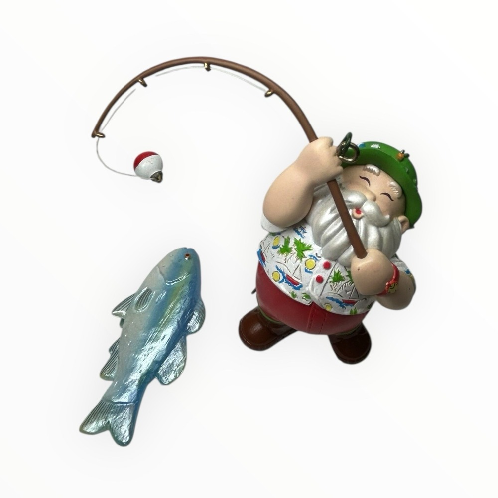 Hawaiian Shirt Vacation fishing-themed Santa Claus Christmas ornament.‎